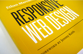 Close up of a yellow book with black and white text: Responsive Web Design, foreword by Jeremy Keith.